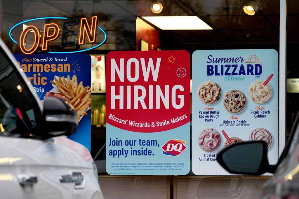 A hiring sign is displayed at a restaurant in Northbrook, Ill., Thursday, May 2, 2024.