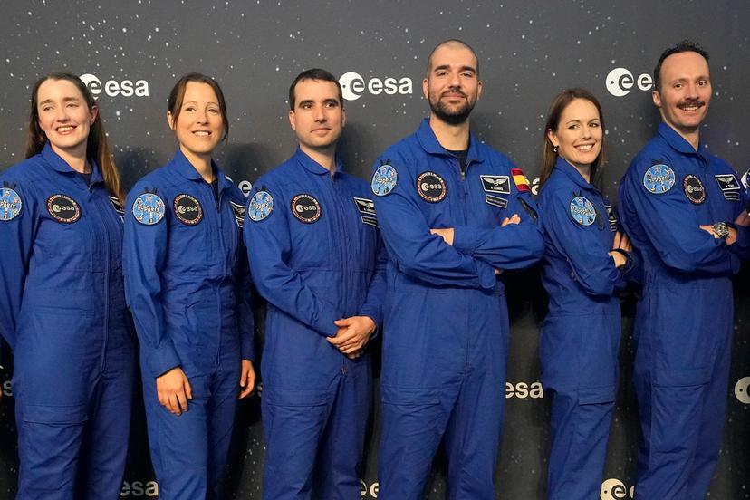 From left, Rosemary Cooga of Britain, Sophie Adenot of France, Raphael Liegeois of Belgium, Pablo Alvarez Fernandez of Spain, Katherine Bennell-Pegg of Australia and Marco Sieber of Switzerland, pose for a family photo at the graduation ceremony of astronaut candidates of the Class of 2022