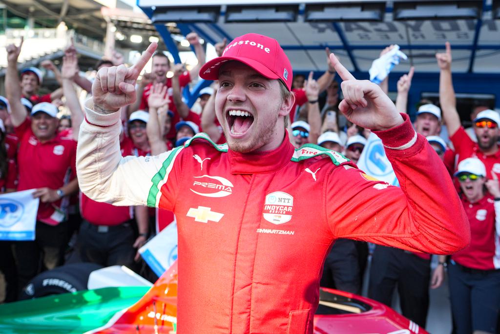 Robert Shwartzman, of Israel, celebrates after winning the pole position during qualifications for the Indianapolis 500 