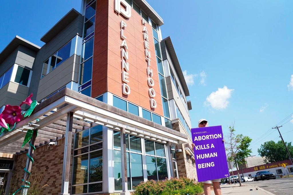 Pro-Life protester demonstrates in front of a Planned Parenthood on July 12, 2022, in Saint Paul, Minn. 