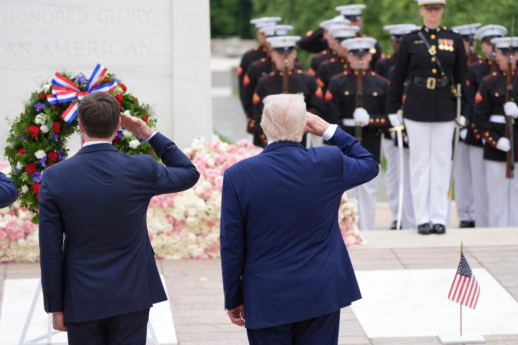 President Donald Trump and VP Vance salute at the Tomb of the Unknown Soldier, on Memorial Day at Arlington National Cemetery, in Arlington, Va.