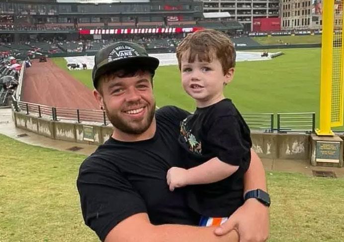 Kelly's son John Mitchell Phelps, grandson, Ayden