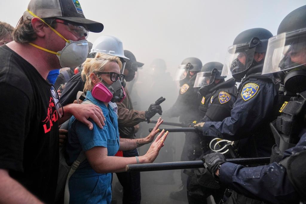 Protesters confront police after taking over the 101 Freeway 
