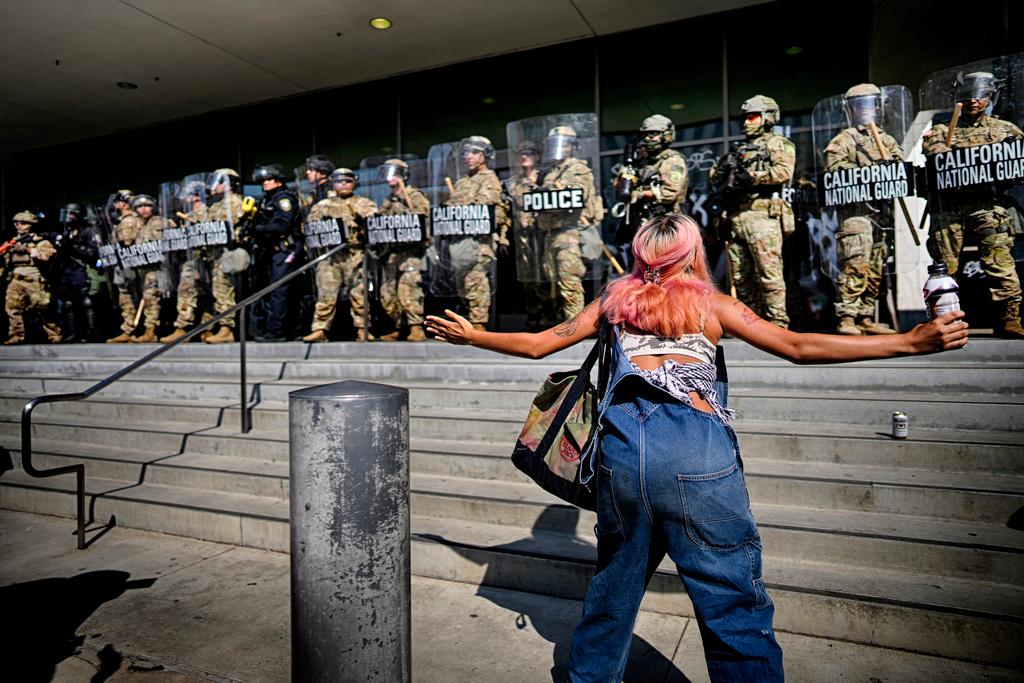 A protester taunts a line of California National Guard protecting a federal building in downtown Los Angeles 