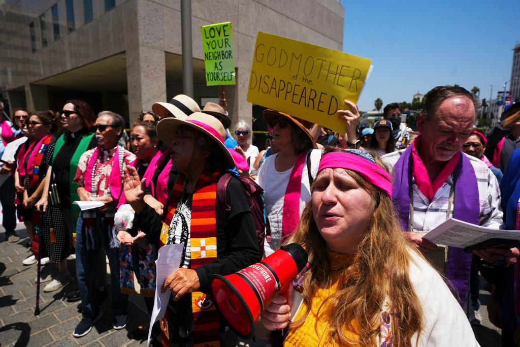 Protesters gather to denounce ICE, U.S Immigration and Customs Enforcement, operations