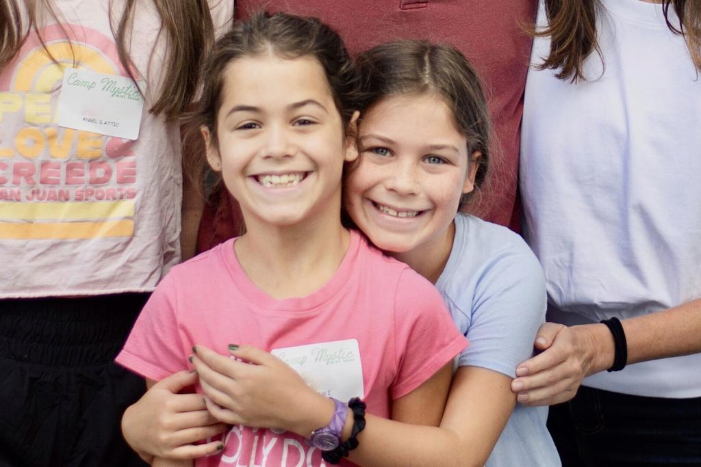 Twin sisters, Hanna Lawrence, left, and Rebecca Lawrence, right, who were two the people who lost their lives in the flooding at Camp Mystic