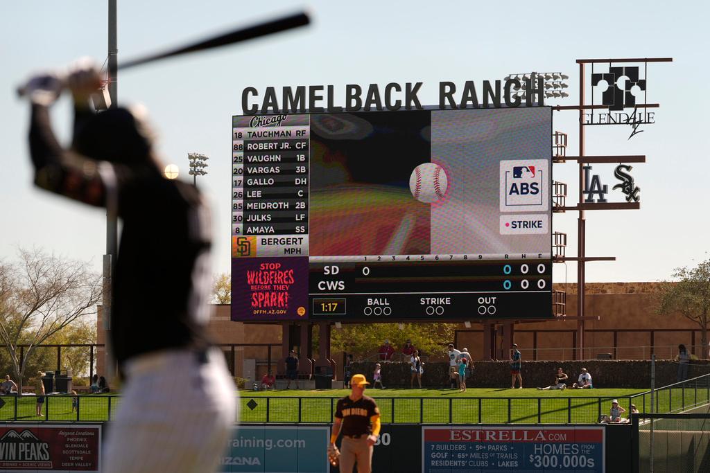 Automated Ball-Strike System plays on the scoreboard after a pitch call was challenged during the first inning of a spring training baseball game between the Chicago White Sox and the San Diego Padres
