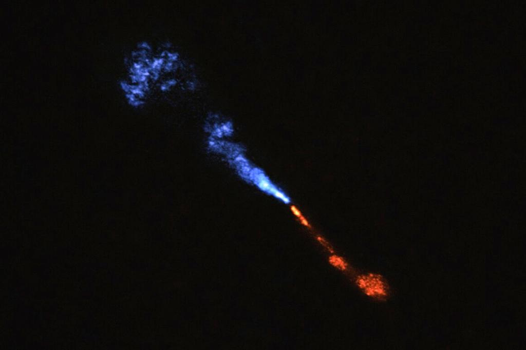 Jets of silicon monoxide blowing away from the baby star HOPS-315