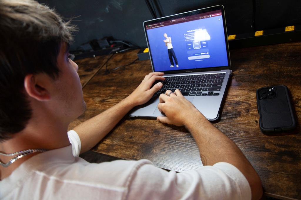 Bruce Perry, 17, demonstrates the possibilities of artificial intelligence by creating an AI companion on Character AI