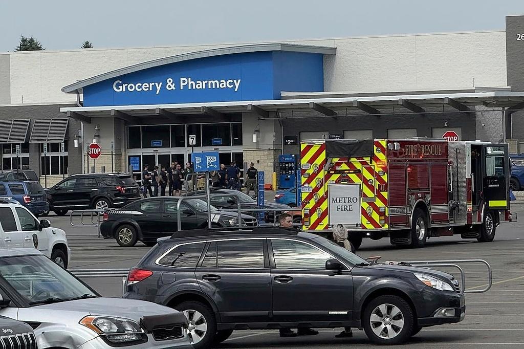Emergency services respond after multiple people were stabbed at Walmart in Traverse City, Mich.