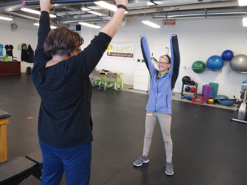 Maple Tree Cancer Alliance Staff members work with clients in their cancer treatment program