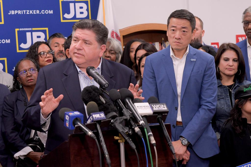 Texas House Democrats join Illinois Governor JB Pritzker who speaks about the Texas Republican plans to redraw the House map. This in Carol Stream, IL .