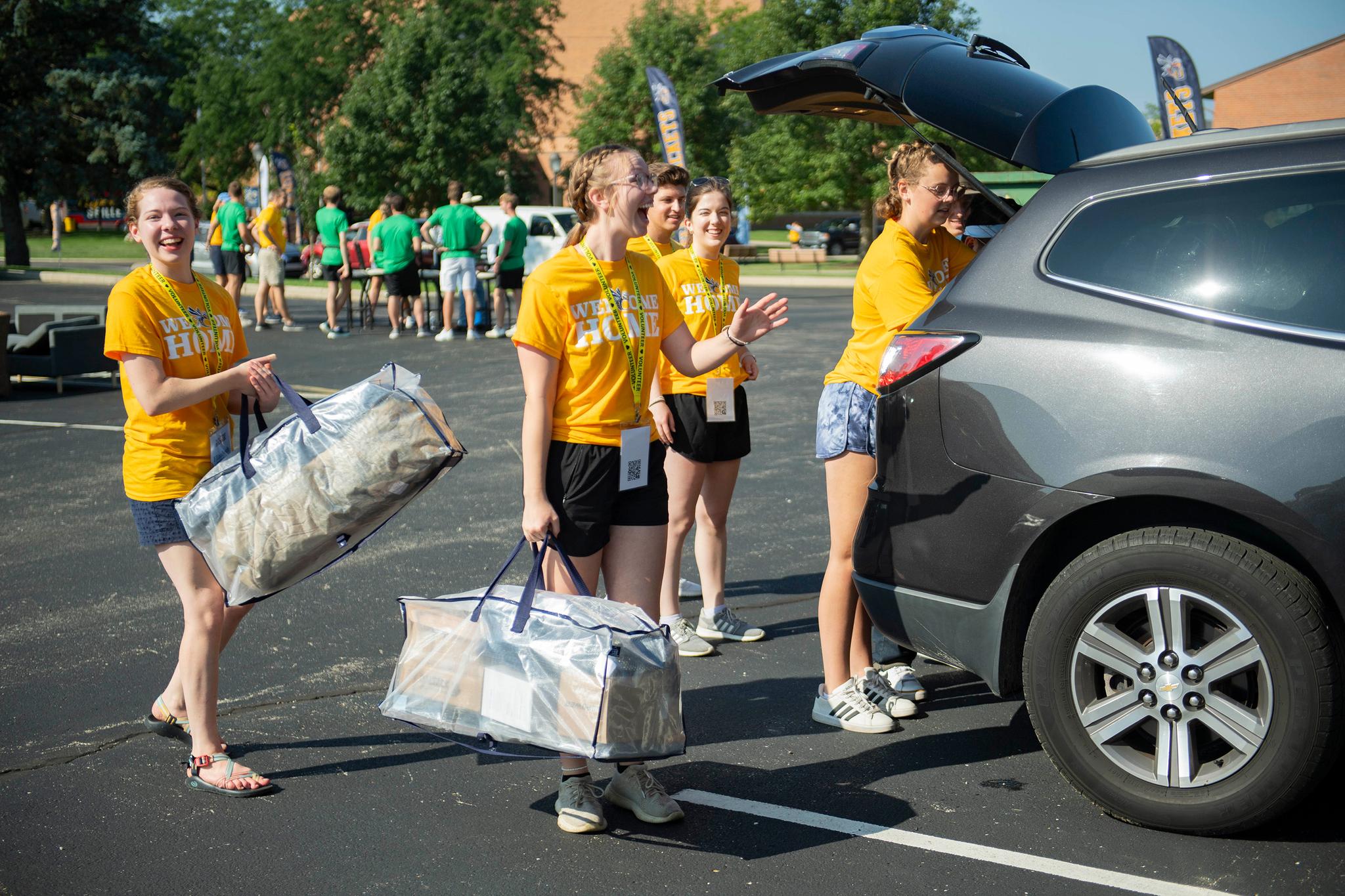 Returning students help first-time Cedarville students move into their residence halls