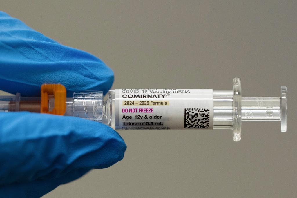 Pfizer and BioNTech COVID-19 vaccine shot 