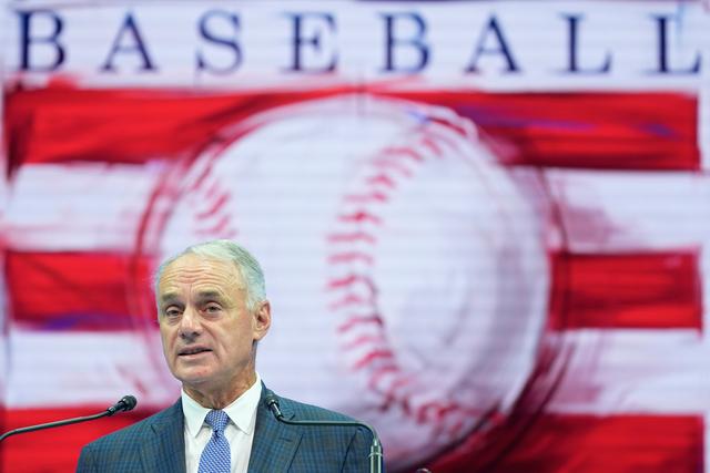MLB Commissioner Rob Manfred speaks during the Baseball Hall of Fame awards 