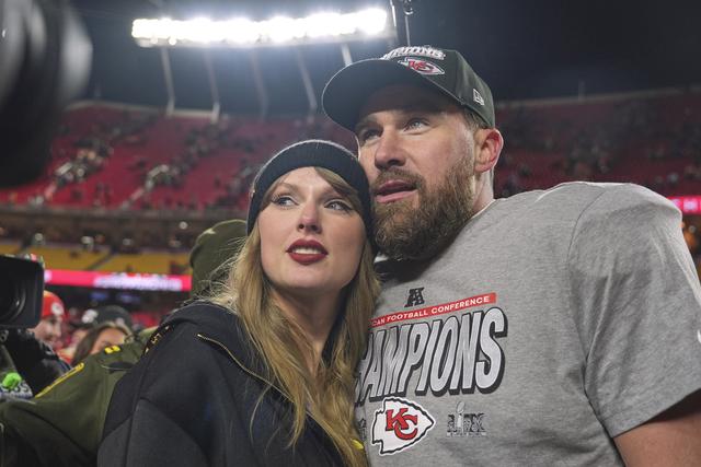 Kansas City Chiefs tight end Travis Kelce with singer Taylor Swift after the Chiefs victory over the Buffalo Bills in the AFC Championship game 