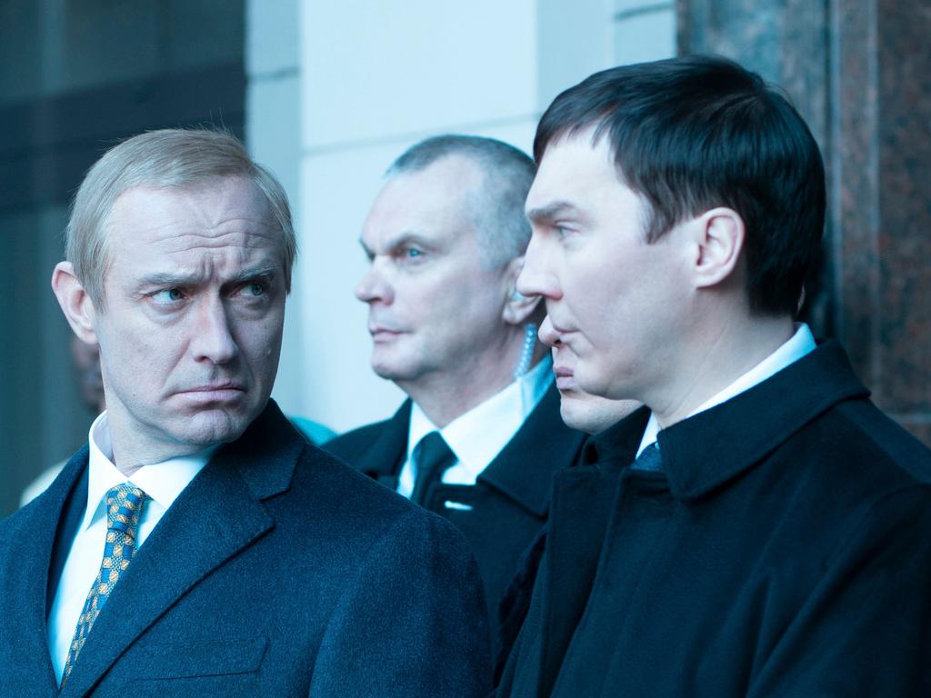  Jude Law, as Vladimir Putin, left, and Paul Dano, as Vadim Baranov, in a scene from "The Wizard of the Kremlin."