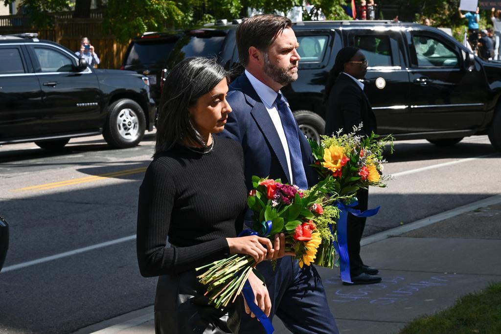 Vice President JD Vance and his wife second lady Usha Vance, arrive to pay their respects to victims of the Annunciation Catholic Church shooting in Minneapolis
