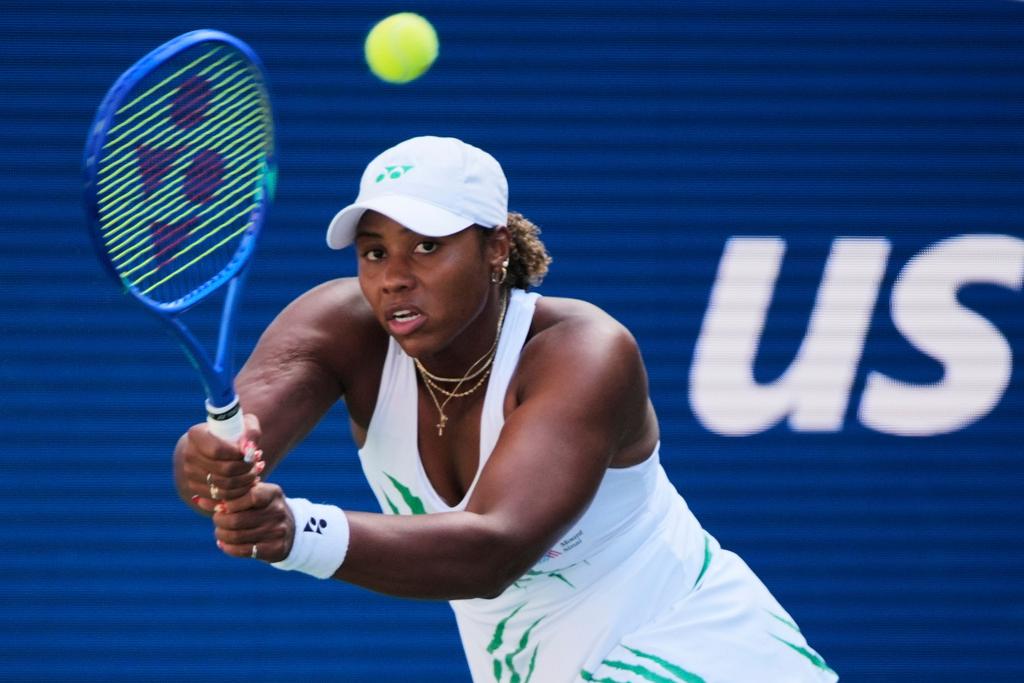 Taylor Townsend, of the United States, returns a shot against Barbora Krejcikova, of the Czech Republic