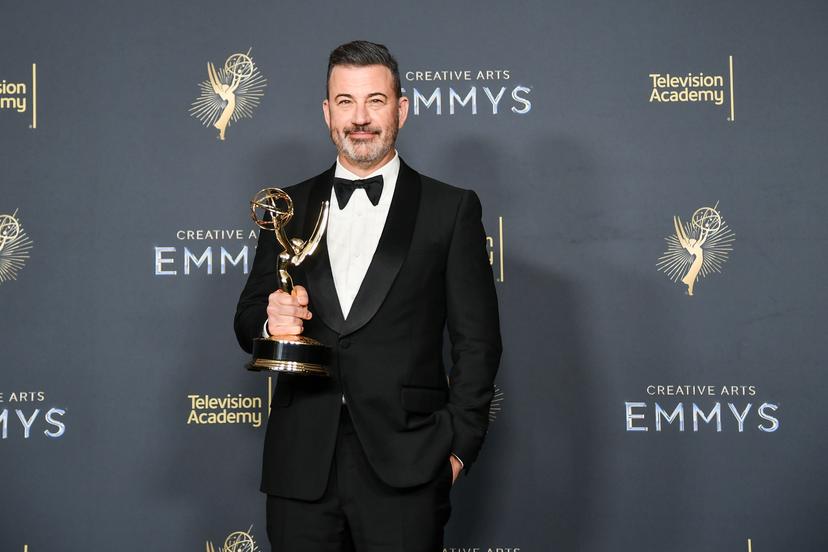 Man holding an Emmy