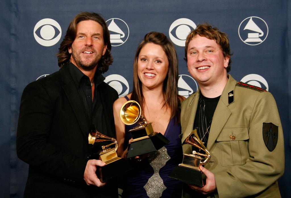 Brett James, from left, Hillary Lindsey, and Gordie Sampson hold their award for best country song, "Jesus Take the Wheel," at the 49th Annual Grammy Awards in Los Angeles 2007