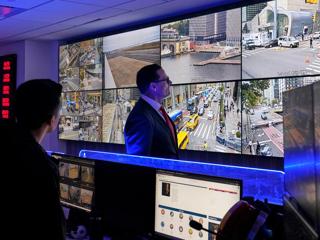 U.S. Secret Service Special Agent in Charge Matt McCool, center, looks at live video surveillance feeds in the agency's New York Field Office, in the Brooklyn