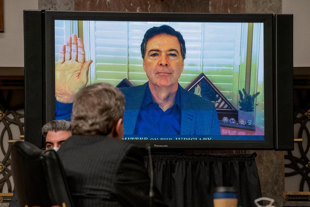 Former FBI director James Comey is sworn via videoconference before testifying during a Senate Judiciary Committee hearing on Capitol Hill in Washington, Wednesday, Sept. 30, 2020, to examine the FBI "Crossfire Hurricane" investigation