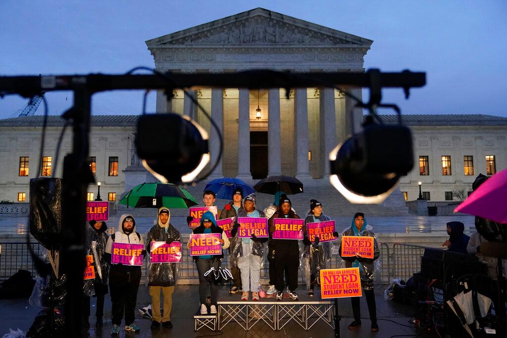 Student debt relief advocates gather outside the Supreme Court on Capitol Hill in Washington, Monday, Feb. 27, 2023. Arguments at the Supreme Court over President Joe Biden's student debt cancellation left some borrowers feeling isolated as they heard such a personal subject reduced to cold legal language.