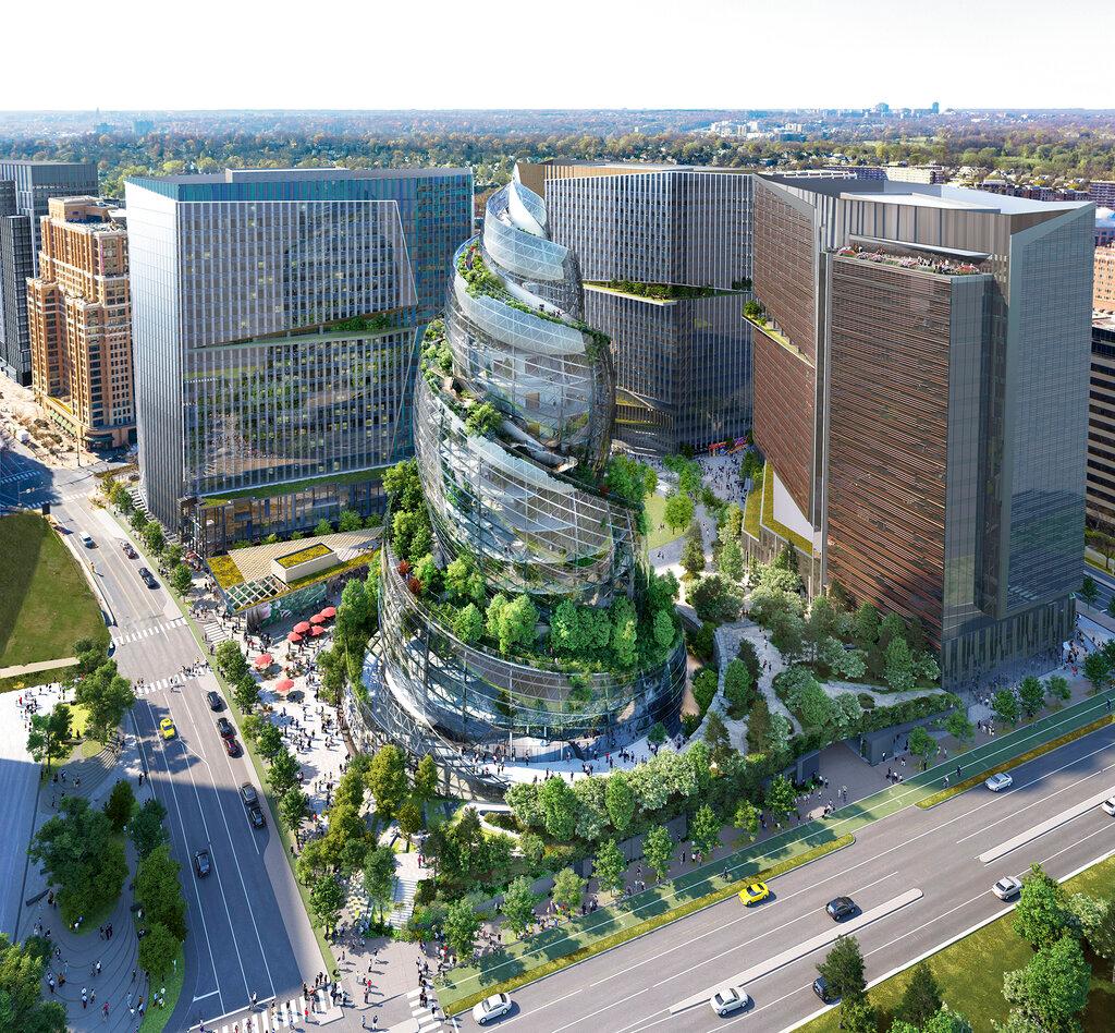 This artist rendering provided by Amazon shows the next phase of the company's headquarters redevelopment to be built in Arlington, Va. Amazon
