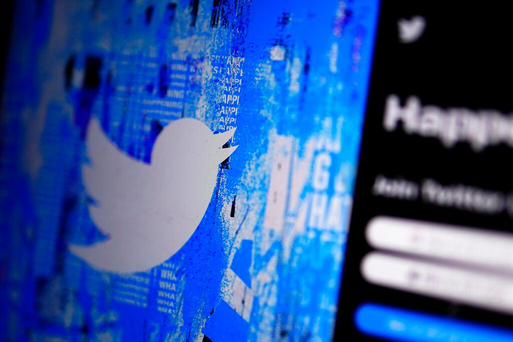 The Twitter splash page is seen on a digital device