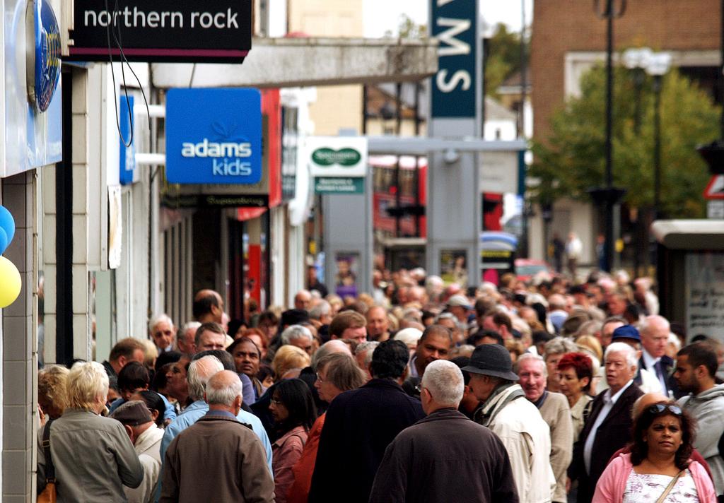 Customers stand in a queue outside a branch of the Northern Rock, the British mortgage lender, in Harrow, London, on Monday Sept. 17, 2007.