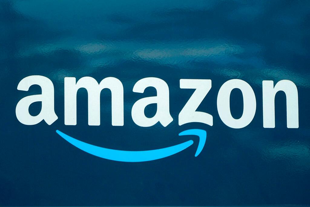 An Amazon logo appears on a delivery van.