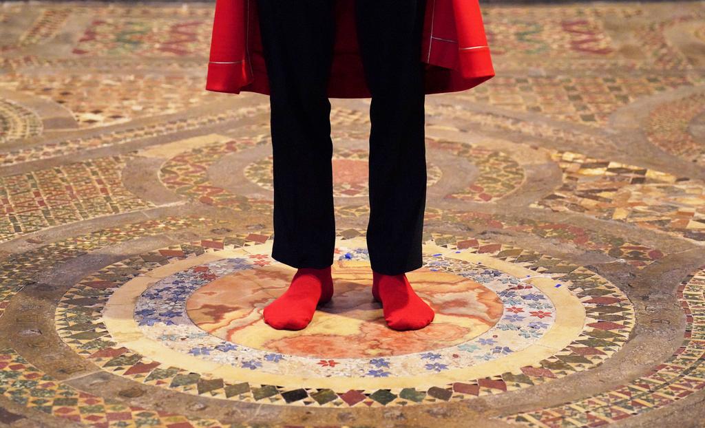 Abbey Marshal Howard Berry stands at the centre of the Cosmati pavement, located before the altar, during a photo call at Westminster Abbey, central London