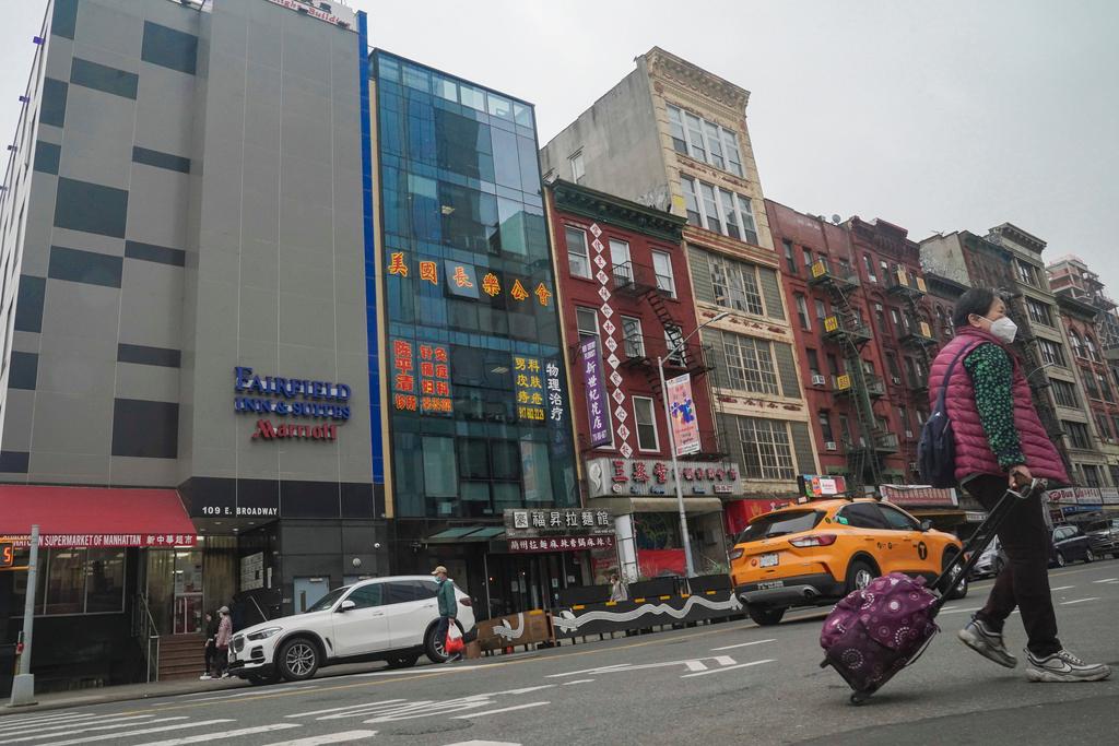 A six story glass facade building, second from left, is believed to be the site of a foreign police outpost for China in New York's Chinatown