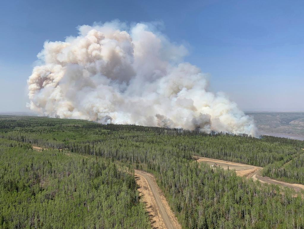 In this photo provided by the Government of Alberta Fire Service, a wildfire burns a section of forest in the Grande Prairie district of Alberta, Canada, Saturday, May 6, 2023. An early May heat wave this weekend could surpass daily records in parts of the Pacific Northwest. The National Weather Service has issued an excessive heat warning for much of the western parts of both Oregon and Washington.