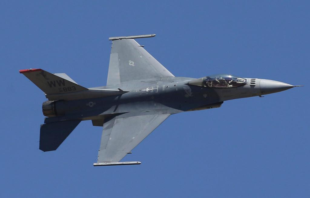  U.S. fighter aircraft F-16 performs aerobatic maneuvers. 