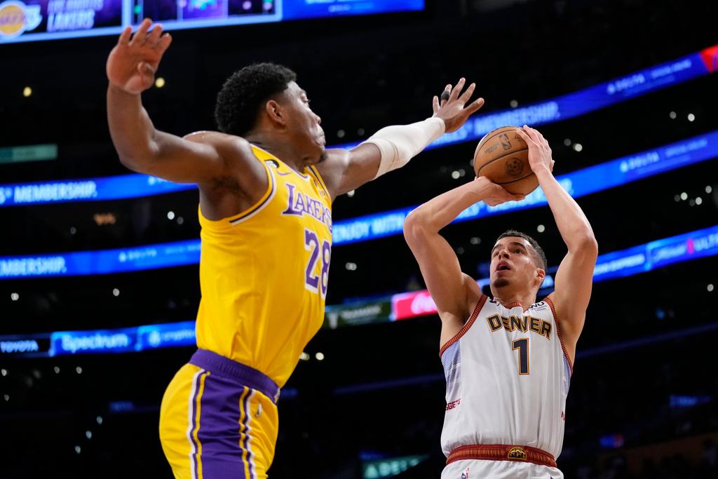 Denver Nuggets forward Michael Porter Jr. (1) shoots over Los Angeles Lakers forward Rui Hachimura (28) in the second half of Game 4 of the NBA basketball Western Conference Final series