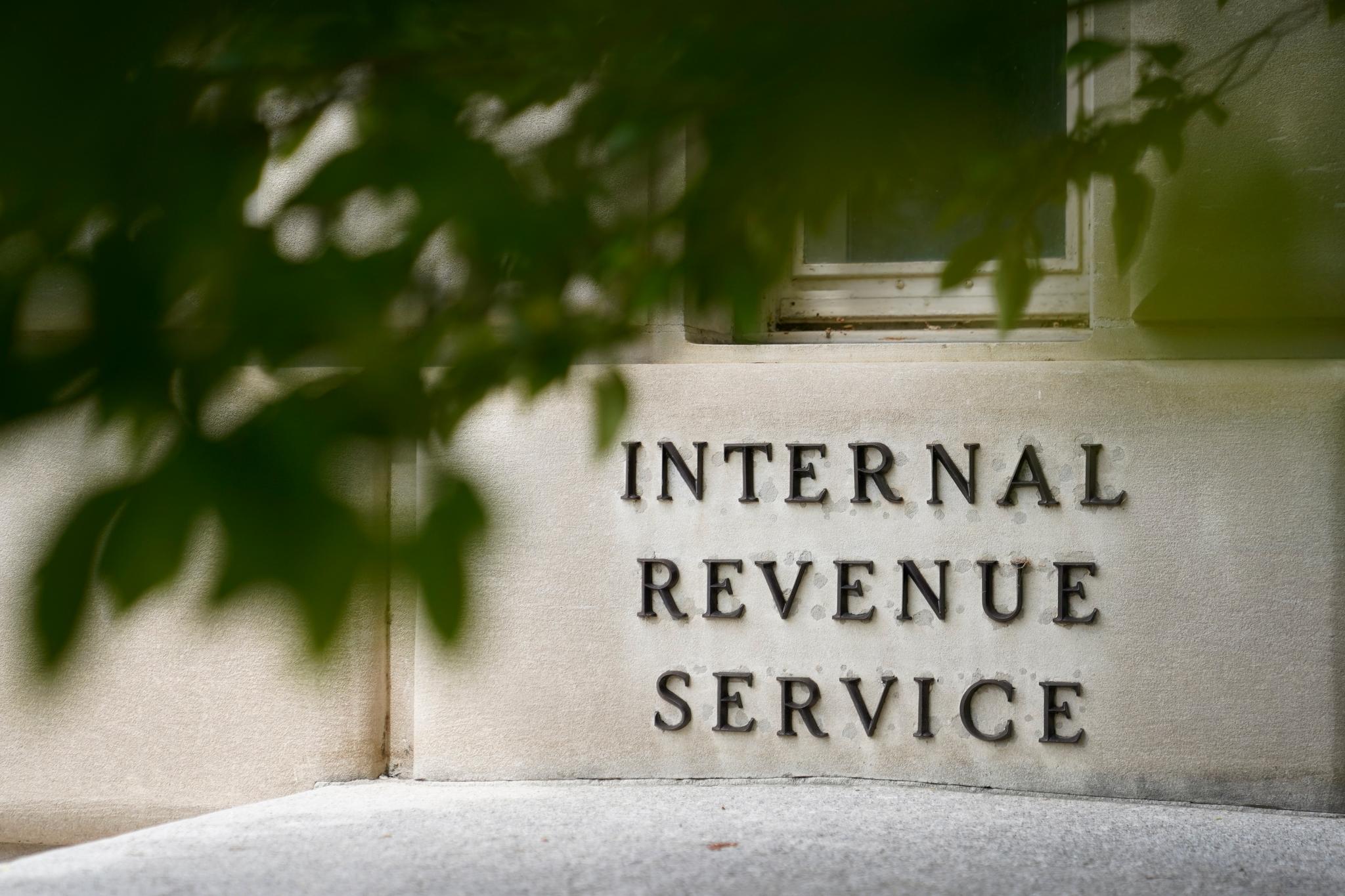 A sign is displayed outside the Internal Revenue Service building on May 4, 2021, in Washington.