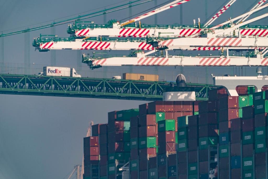 Shipping containers are seen stacked on the Evergreen terminal at the Port of Los Angeles in San Pedro, Calif.