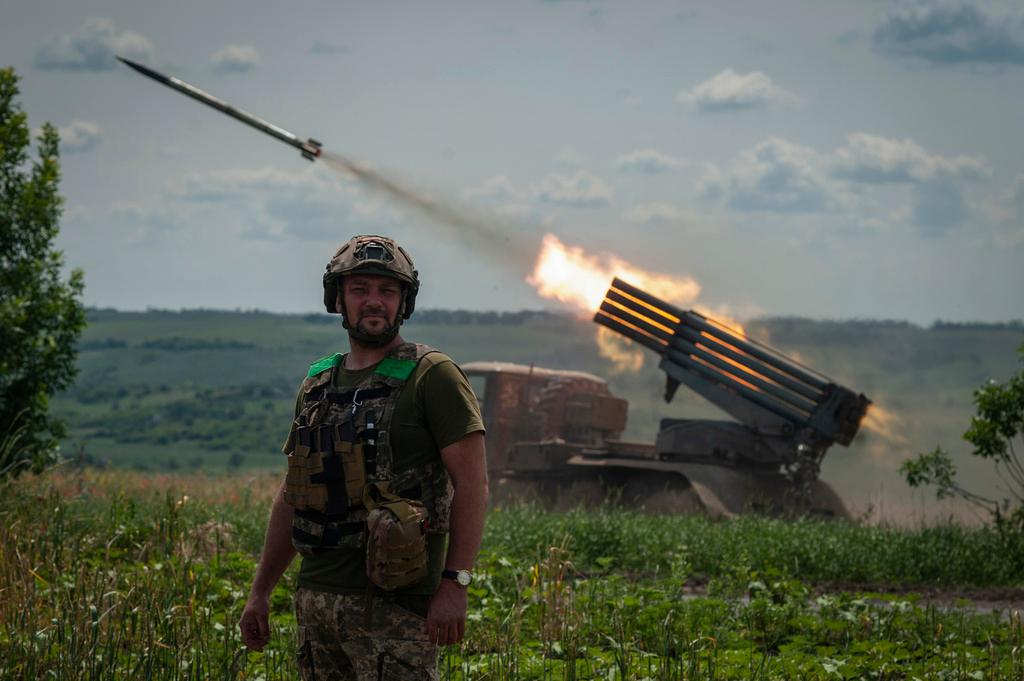 A Ukrainian MSLR BM-21 "Grad" fires towards Russian positions