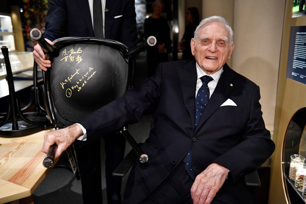 2019 Nobel Laureate in chemistry John B. Goodenough looks on after signing a chair as part of the traditional Nobel Chair Signing ceremony at the Nobel Museum in Stockholm, Sweden