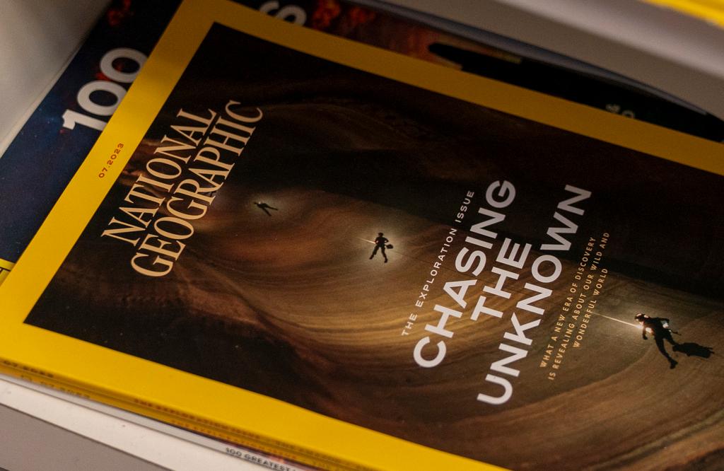 The July 2023 edition of National Geographic is for sale at a newsstand