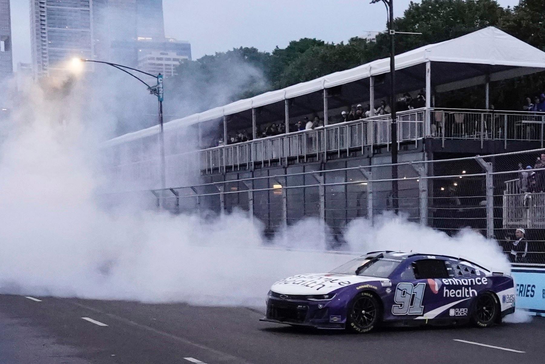 Shane Van Gisbergen celebrates after winning a NASCAR Cup Series auto race at the Grant Park 220 Sunday, July 2, 2023, in Chicago.