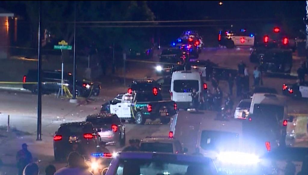 Police arrive on the scene of a deadly shooting late Monday, July 3, 2023 in Forth Worth, Texas. Authorities say gunfire erupted following a local festival in the Como neighborhood in the city's southwest.