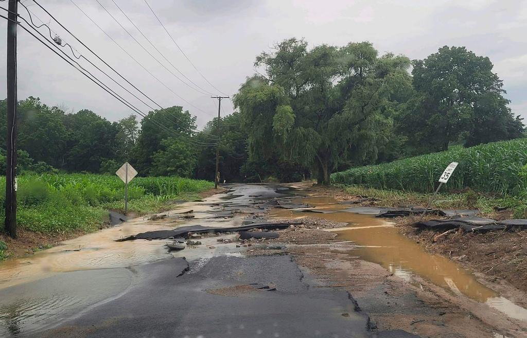 Flooding along road, in Phillipsburg, N.J.