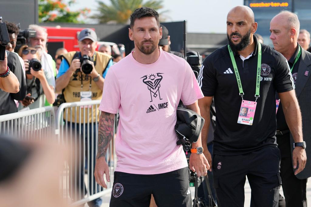 Inter Miami forward Lionel Messi, front left, arrives before a League Cup soccer match against Cruz Azul