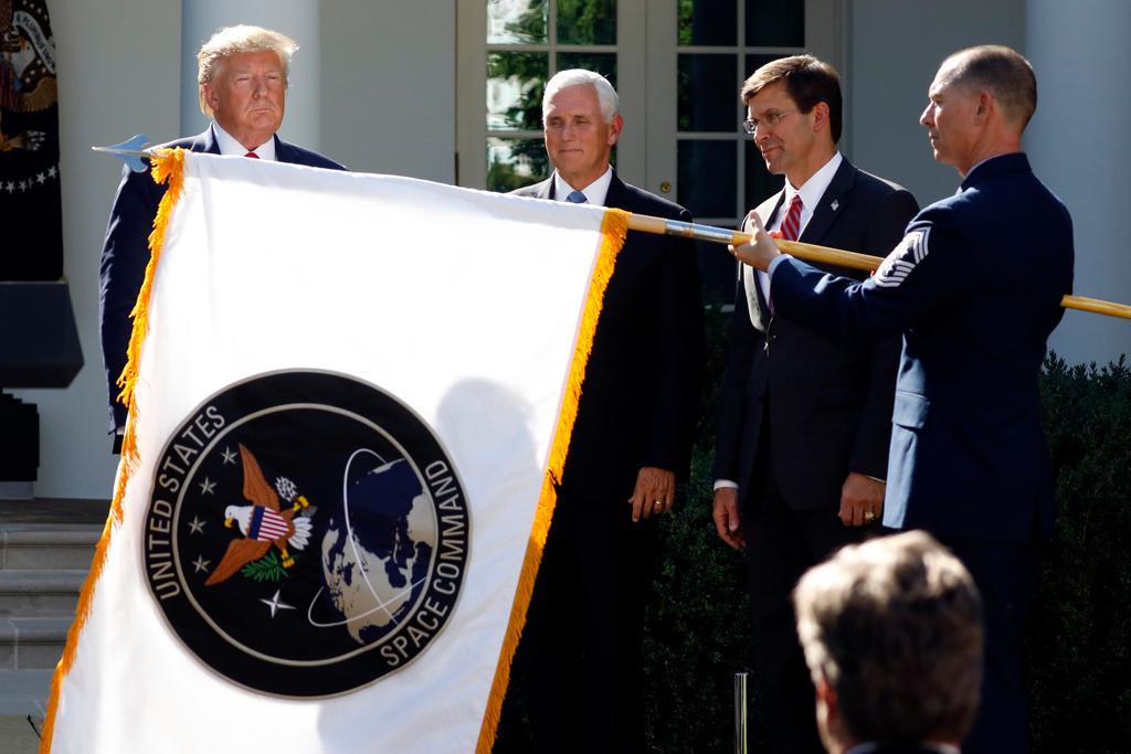 (2019) The flag of the U.S. Space Command is presented during a ceremony for the establishment of the command in the Rose Garden of the White House