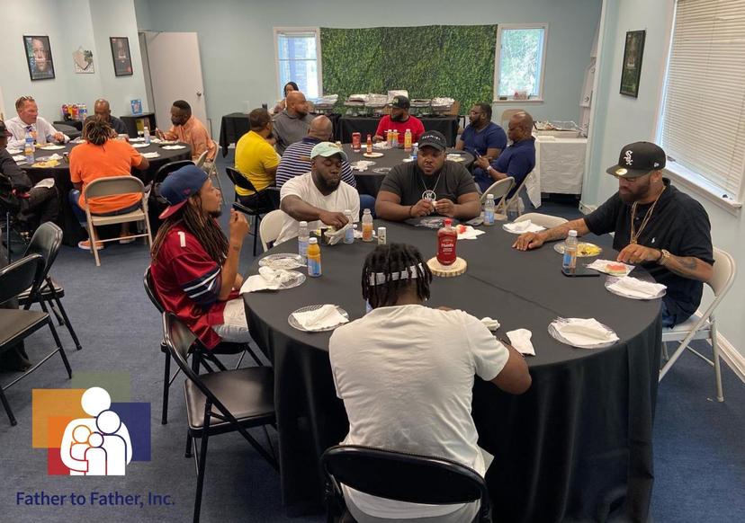 Dads attending Father to Father breakfast