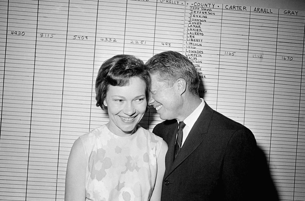 Then Georgia State Sen. Jimmy Carter hugs his wife, Rosalynn, at his Atlanta campaign headquarters