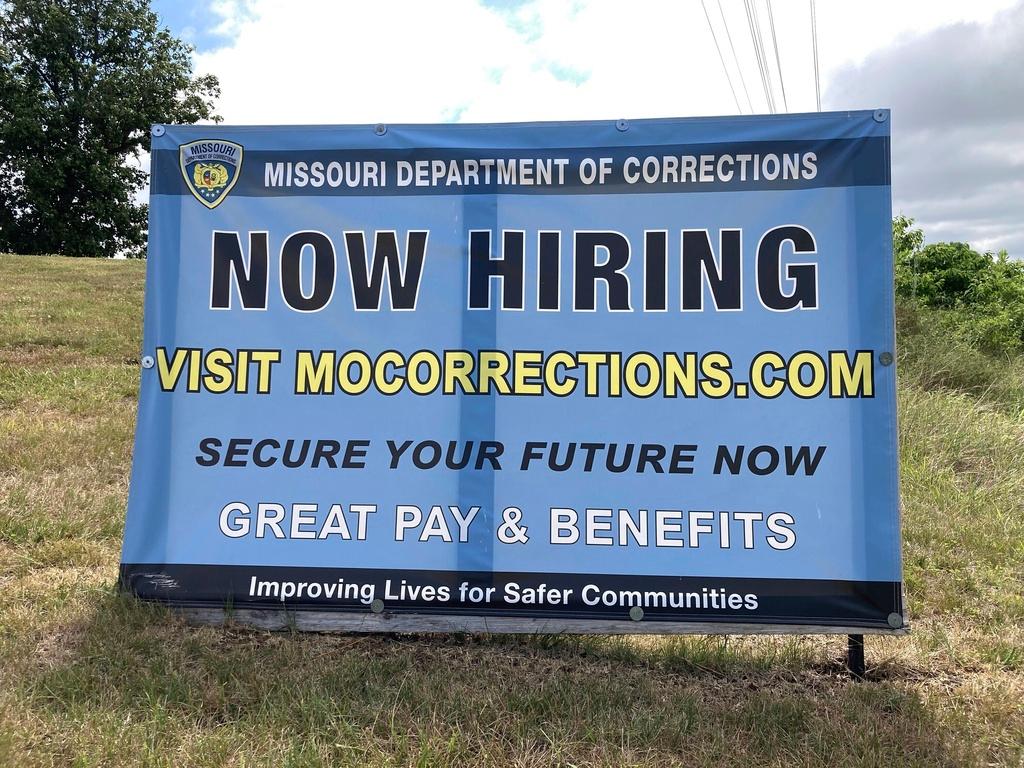 A "Now Hiring" sign is shown at the entrance to a Missouri Department of Corrections prison facility, Thursday, July 13, 2023, in Fulton, Mo.
